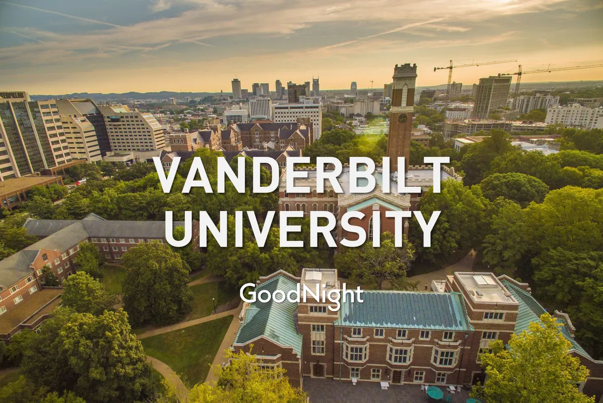 A scenic view of Vanderbilt University’s iconic clock tower rises above lush greenery and the surrounding skyline. This image captures the university’s close proximity and the inviting atmosphere of the broader neighborhood.